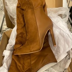 Brand new knee high boots